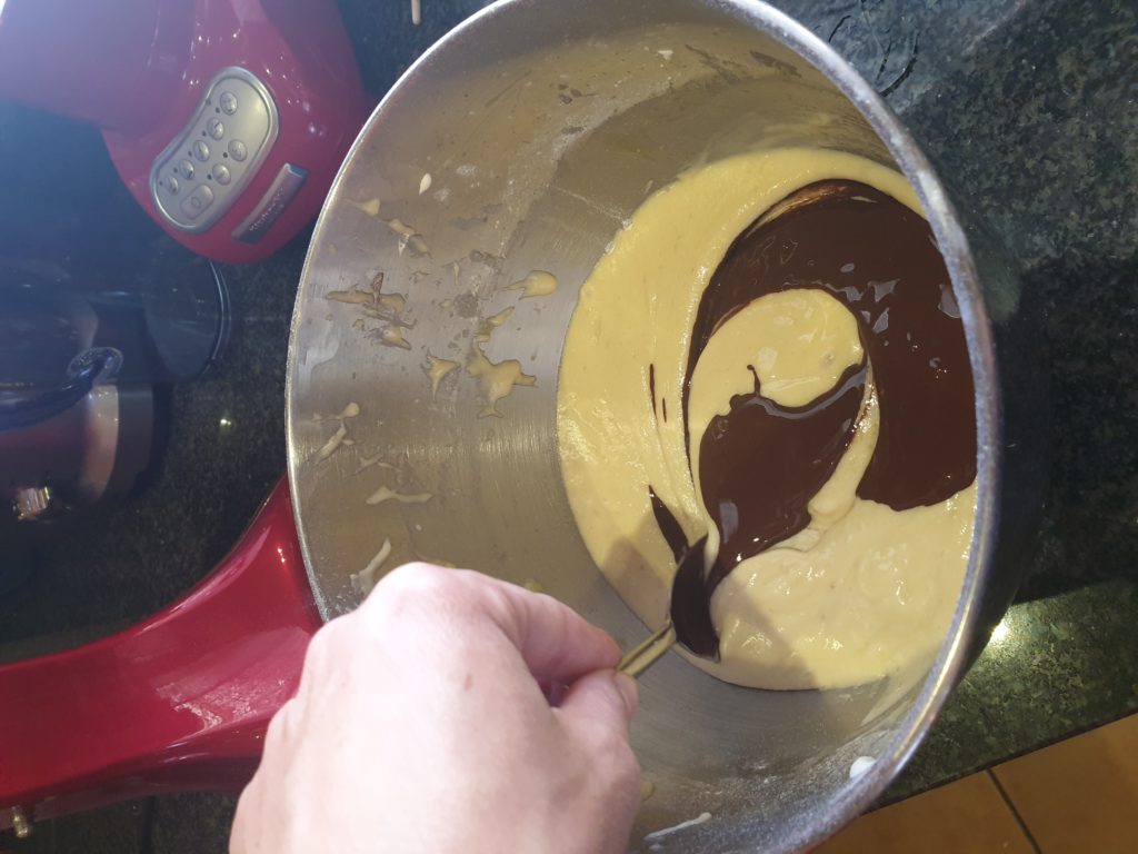 Swirling in the cocoa mixture